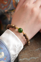 Kynam Agarwood Bracelet, Spinach-Green Nephrite Jade Focal Bead