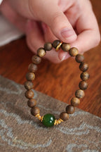 Kynam Agarwood Bracelet, Spinach-Green Nephrite Jade Focal Bead
